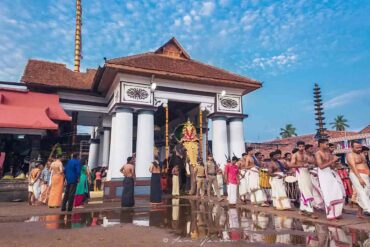 Serene view of Vaikom Shiva Temple, an ancient and sacred Hindu temple dedicated to Lord Shiva, surrounded by lush greenery and traditional architecture, reflecting spiritual and cultural heritage in Kerala, India.