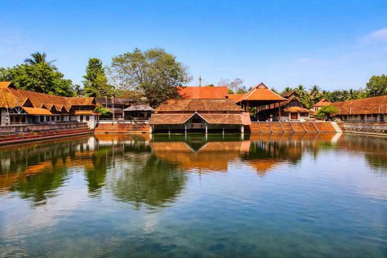 Ambalapuzha Krishna Temple in Kerala with traditional architecture reflected in the temple pond