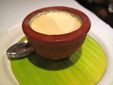 Traditional Bengali Mishti Doi served in a clay pot