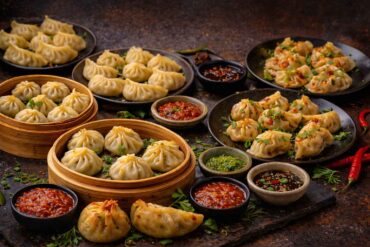 Veg momos recipe featuring 15 café-style veg and vegan variations served with different dipping sauces