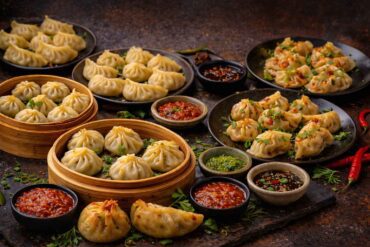 Veg momos recipe featuring 15 café-style veg and vegan variations served with different dipping sauces
