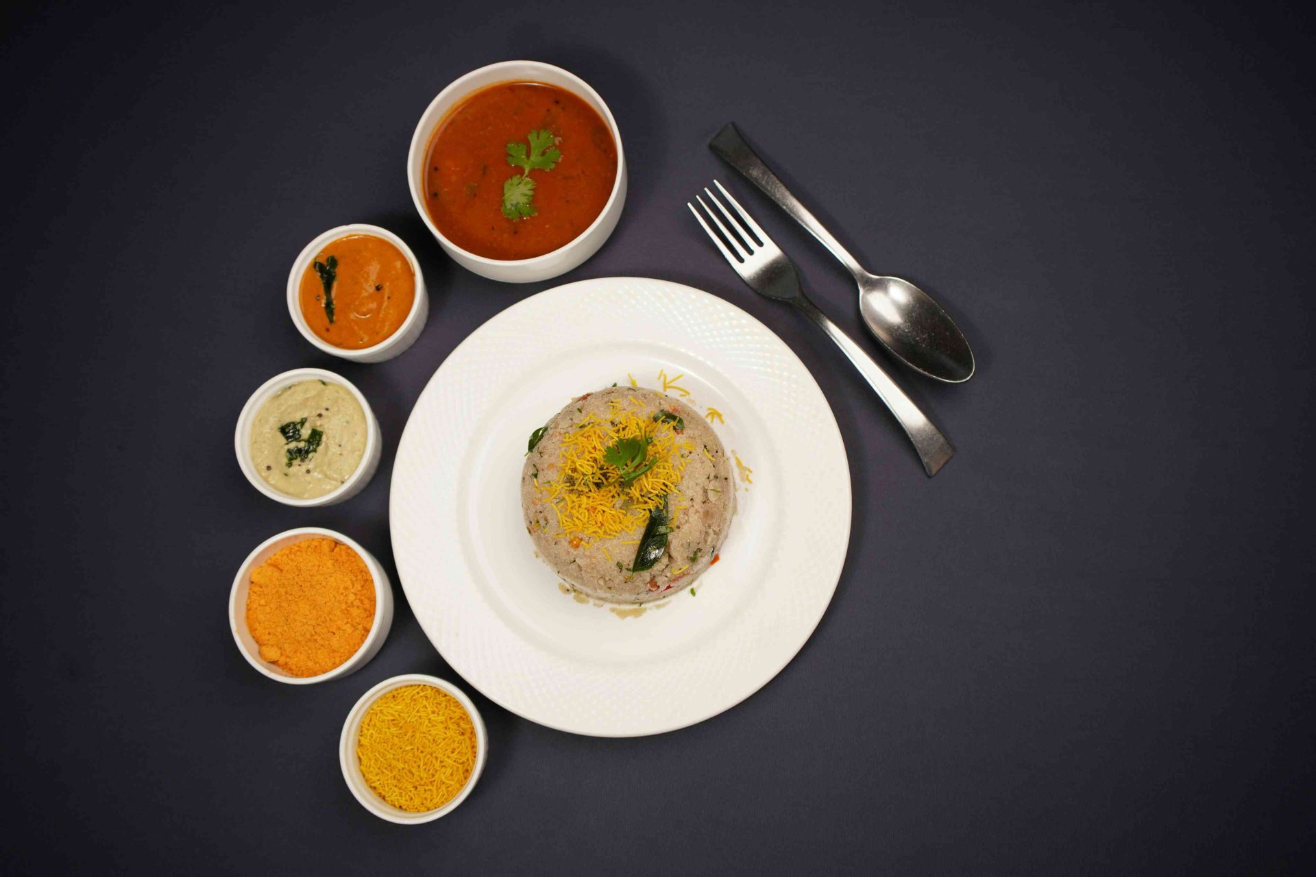 Rava upma with sides of chutney and sambar